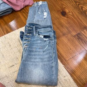 High-Rise Light Blue Straight Leg Jeans with Distressed Detail